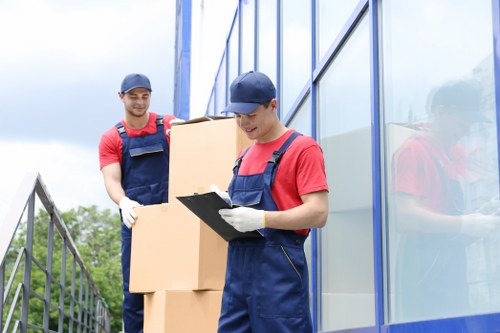 Home move service in West Hampstead with boxes and furniture prepared for loading
