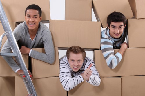 Local moving team handling furniture near West Hampstead flats