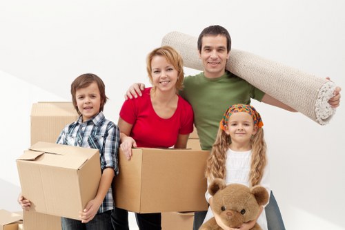 Furniture and household items being loaded for a West Hampstead move
