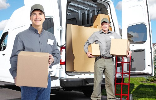 Moving team reviewing service terms before transport